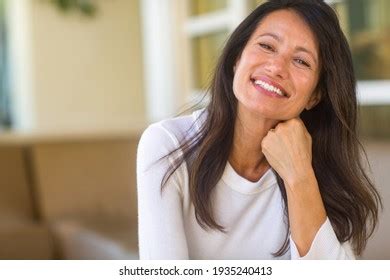 Beautiful Mature Woman Sitting On Sofa Stock Photo 1935240413