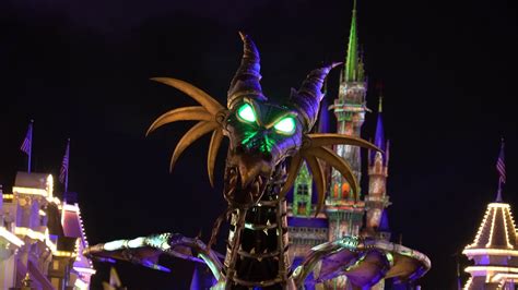 Maleficent Dragon Rolls Down Main Street Usa At Night Villains