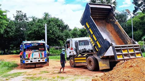 Bulldozer Loading Trucks HYUNDAI Dump Trucks Dump Truck Bulldozer