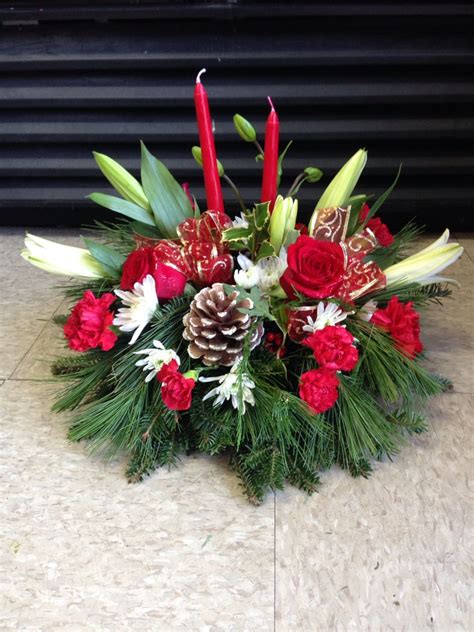 Christmas Centerpiece With Red Roses And White Lilies