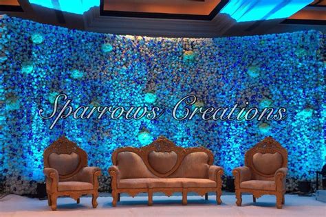 Complete Floral Backdrop For Engagement Ceremony With The Essence Of Peacock Theme Wedding