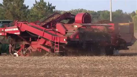 Spudnik 6400 Potato Harvester Pulled By Deere 8285r Youtube