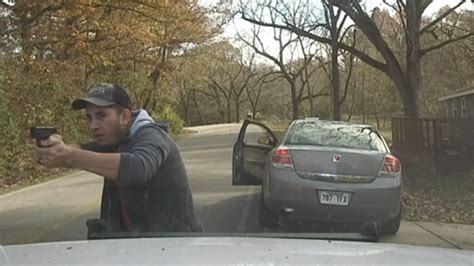 Dashcam Video Shows Brazen Gun Battle Between Police And Suspect In