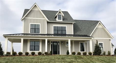 White Trim Grey Siding Farmhouse