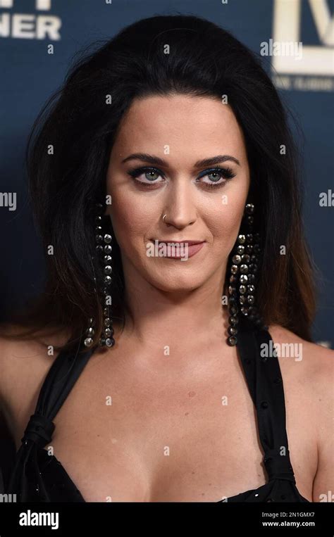 Katy Perry poses during her handprint ceremony after the premiere of ...