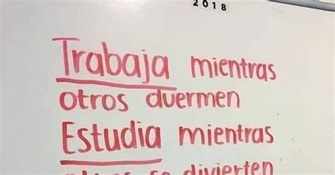 A White Board With Red Writing On It