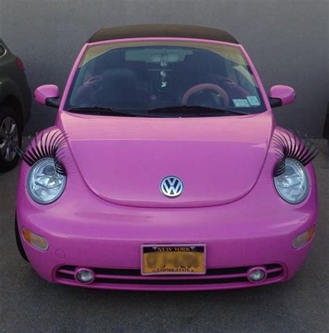 Pink Volkswagen Beetle Convertible With Eyelashes