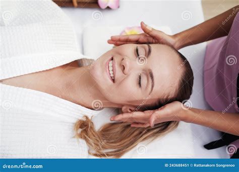 Asian Massage Therapist Woman Is Making Traditional Head And Facial