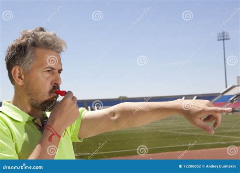 Angry Football Referee Blowing A Whistle Stock Photo Image Of Looking