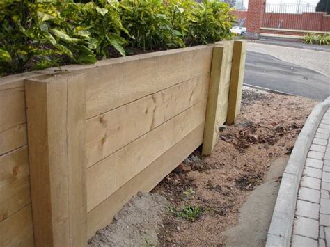 How To Build A Vertical Sleeper Retaining Wall