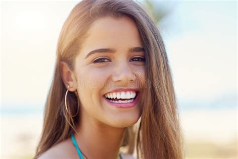 Her Smile Brightens Up Any Day Portrait Of An Attractive Young Woman