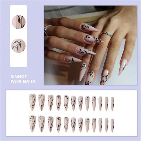 MARCH NAILS SPRING NAILS NUDE NAILS BLACK LEAVES DESIGN ALMOND