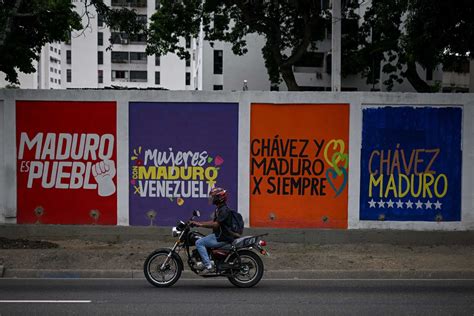 Poder e oposição nas ruas de Caracas na campanha das presidenciais na