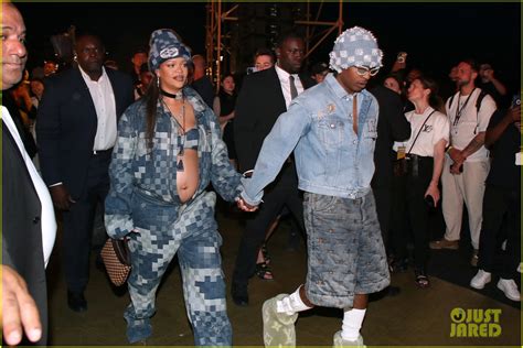 Pregnant Rihanna Bares Baby Bump While Attending Louis Vuitton Show In