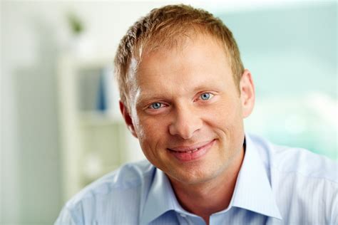 Smiling businessman | Portrait of handsome businessman looki… | Steve wilson | Flickr