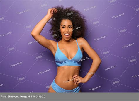 Beautiful African American Woman In Bikini On Color Background Stock Photography Agency