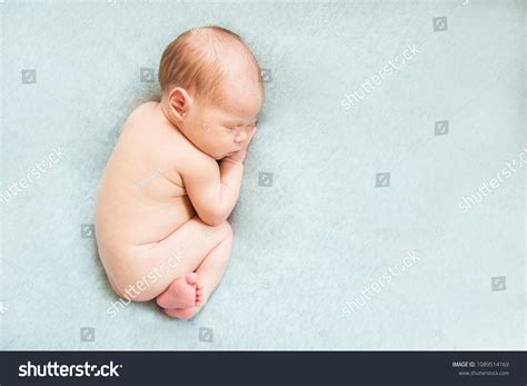 Naked Newborn Baby Sleeping On Light Stock Photo 1089514169 Shutterstock