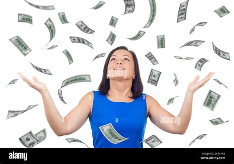 Portrait Of Happy Woman Celebrates Success Under A Money Rain Falling