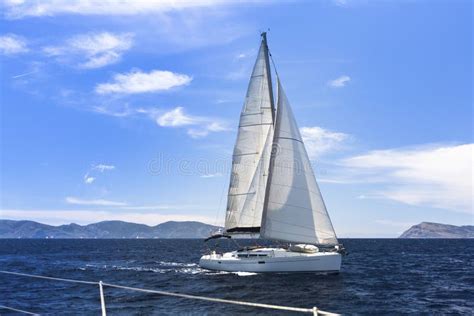 Ship Yachts With White Sails In The Sea Sailing Yacht Race Stock Image