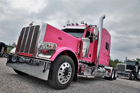 Look Closer: Stunning Pink Peterbilt 389 72 in Raised Roof Glider Kit - Fitzgerald Glider Kits