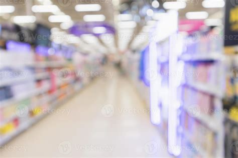 Abstract blur supermarket discount store aisle and product shelves