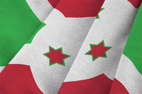 Premium Photo Burundi Flag With Big Folds Waving Close Up Under The