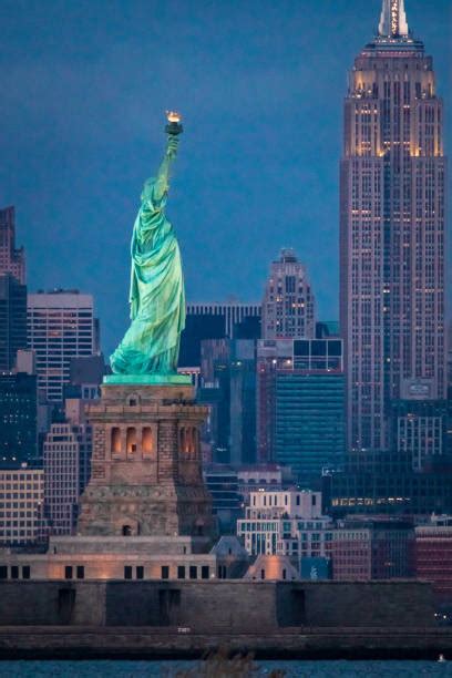 Statue Of Liberty Torch Night Stock Photos, Pictures & Royalty-Free Images - iStock