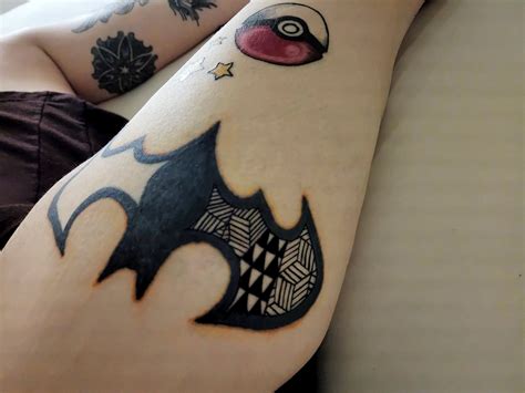 Batman Logo Tattoo Arm