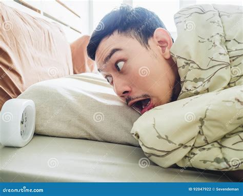 Funny man wake up late. stock photo. Image of awakening - 92047922