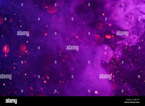 Colorful Neon Smoke Clouds And Shiny Glitter Lights Bokeh Abstract