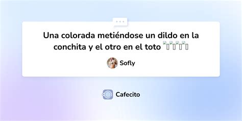Una colorada metiéndose un dildo en la conchita y el otro en el toto