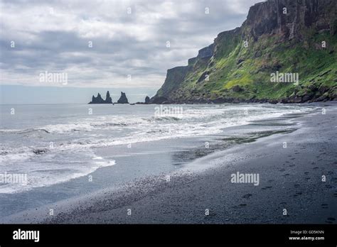 The Black Beach Reynisfjara With The Reynisdrangar Basalt Sea Stacks In