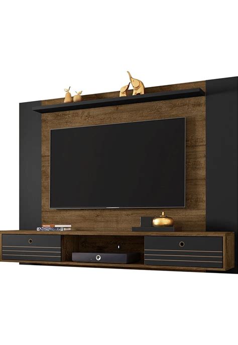 An Entertainment Center With A Flat Screen Tv Mounted On It S Side And