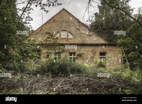 Old House Construction Surrounded By Trees And Grass Stock Photo Alamy