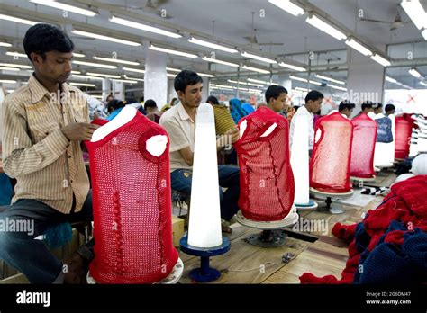 The Garments Factory Both Man And Women Are Working Hard To Get Profess