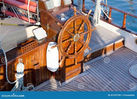 Old Nostalgic Sail Boat Cockpit And Rudder Of Teak Wood Stock Image