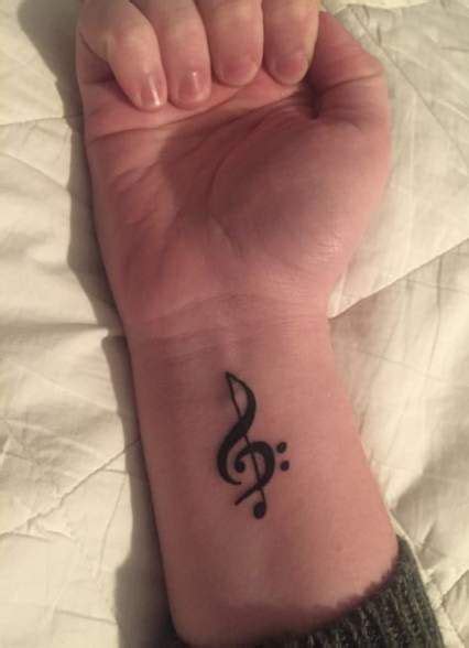 Meaningful Treble Clef Tattoo Designs For Music Lovers