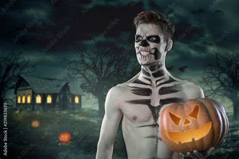 Sport And Health Food Halloween Gourd Young Man With Muscular Body