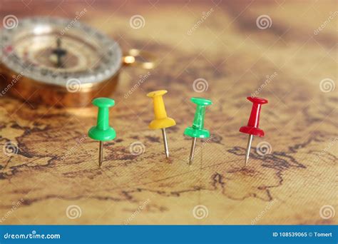 Image Of Pins Attached To Map Showing Location Or Travel Destination Next To Vintage Compass