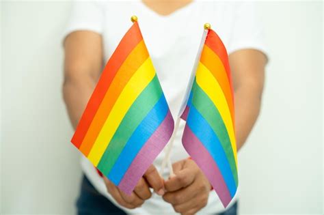 Premium Photo Woman Holding Lgbt Rainbow Colorful Flag Symbol Of Lesbian Gay Bisexual