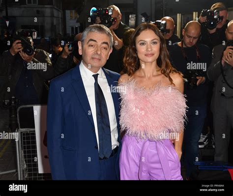 London Uk 3rd Oct 2018 Rowan Atkinson And Olga Kurylenko Attend