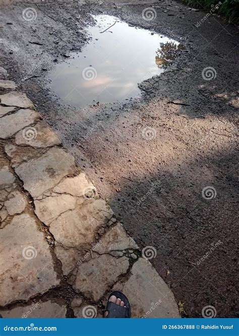 Puddles On Potholes Asphalt Road Stock Photo Image Of Asphalt Road