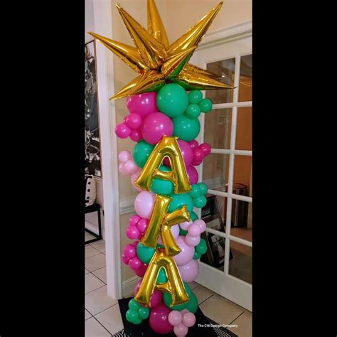 Pinks And Green With Gold Letters And Starburst Topper Balloon Columns