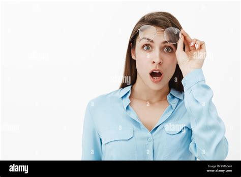 No Way What Happened Portrait Of Shocked Emotive Adult Female Brunette Taking Off Glasses