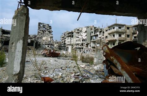 Slide Camera In Front Of Ruins Of Devastated Neighborhoods In Homs