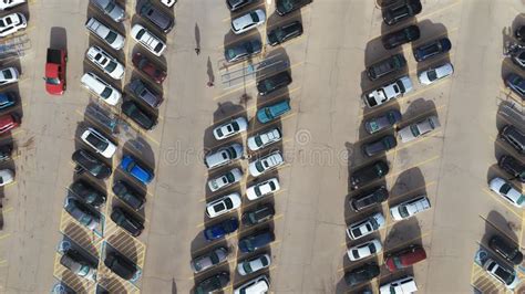 Aerial Top Down Wide View of Car Moving and Standing on Parking Lot ...