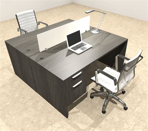 an office desk with a laptop computer and chair