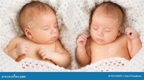 Newborn Babies Twins Sleep in Bed, Sleeping New Born Twin Kids Stock Image - Image of newborn ...