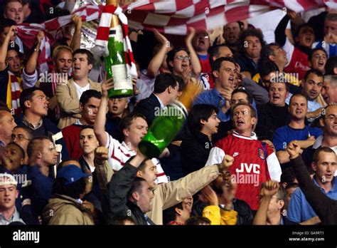 Arsenal Fans Celebrate Their Team Winning The Fa Barclaycard