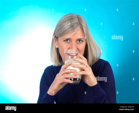 Mature Woman Drinking Milk Model Hi Res Stock Photography And Images Alamy